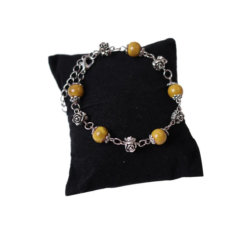 Fashionable and simple bohemian porcelain bead bracelet, alloy rose collocation, exquisitely hand-woven